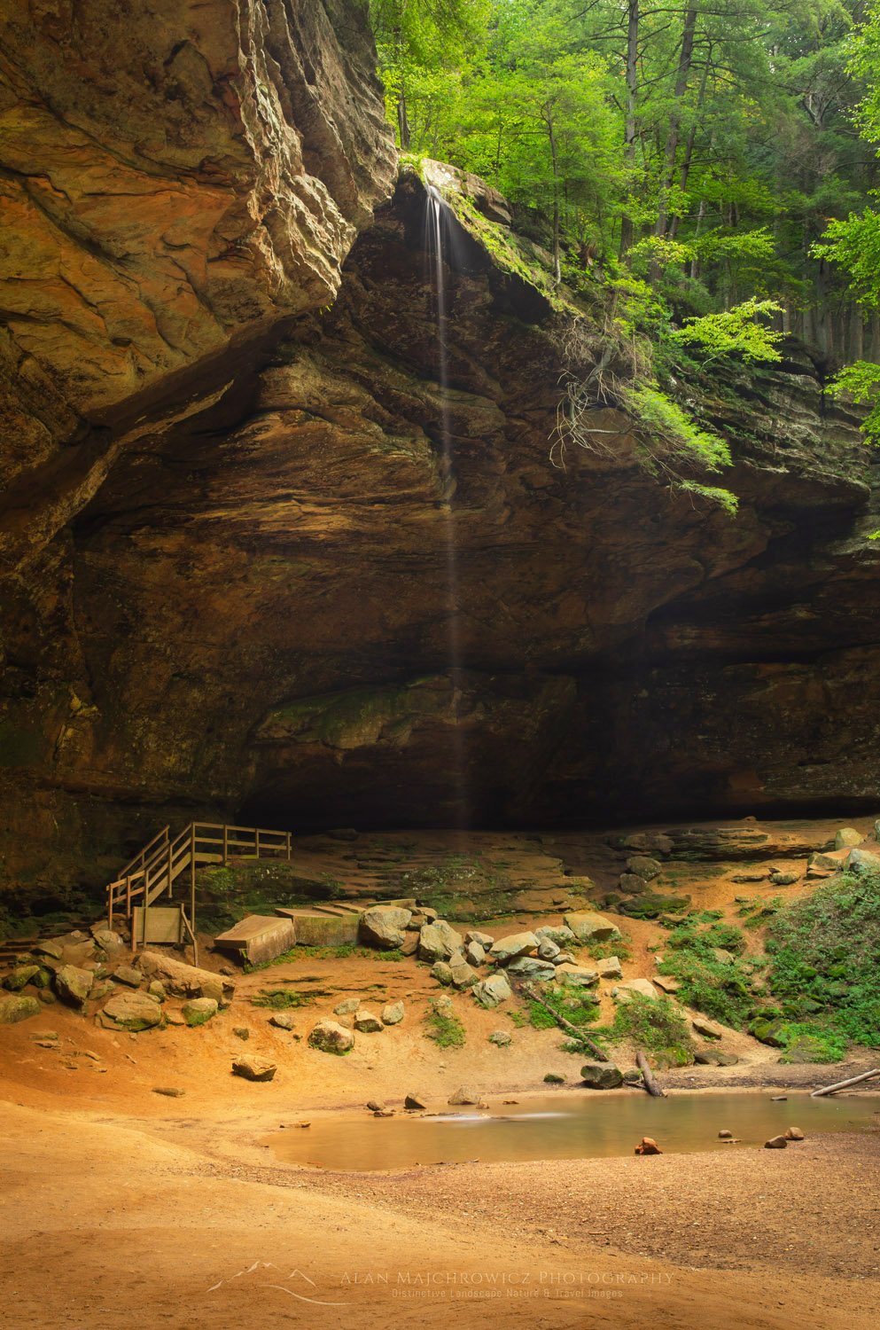 Ash Cave, formed from Blackhand Sandstone it is the large recessed cave in the state. Named after the huge pile of ashes found under the shelter by early settlers. Hocking Hills State Park Ohio #63266
