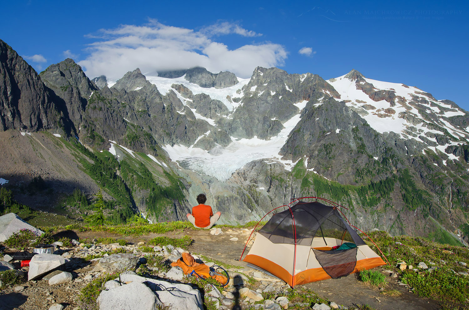 Hiker admiring view of Mount Shuksan from backcountry camp, Mount Basker Wilderness North Cascades Washington #58079
