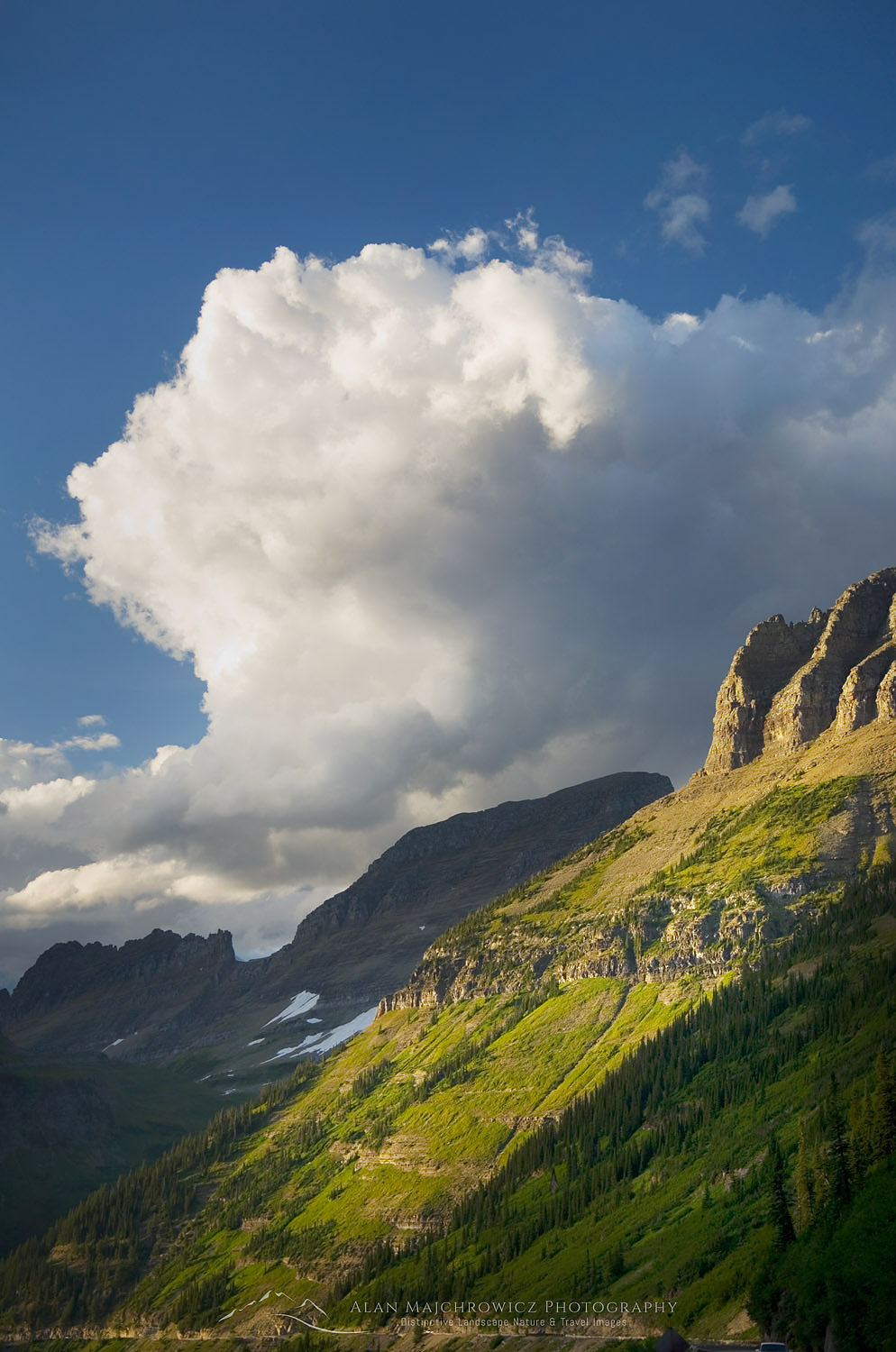 Clouds and the Garden Wall bathed in evening light, Glacier National Park Montana #46513
