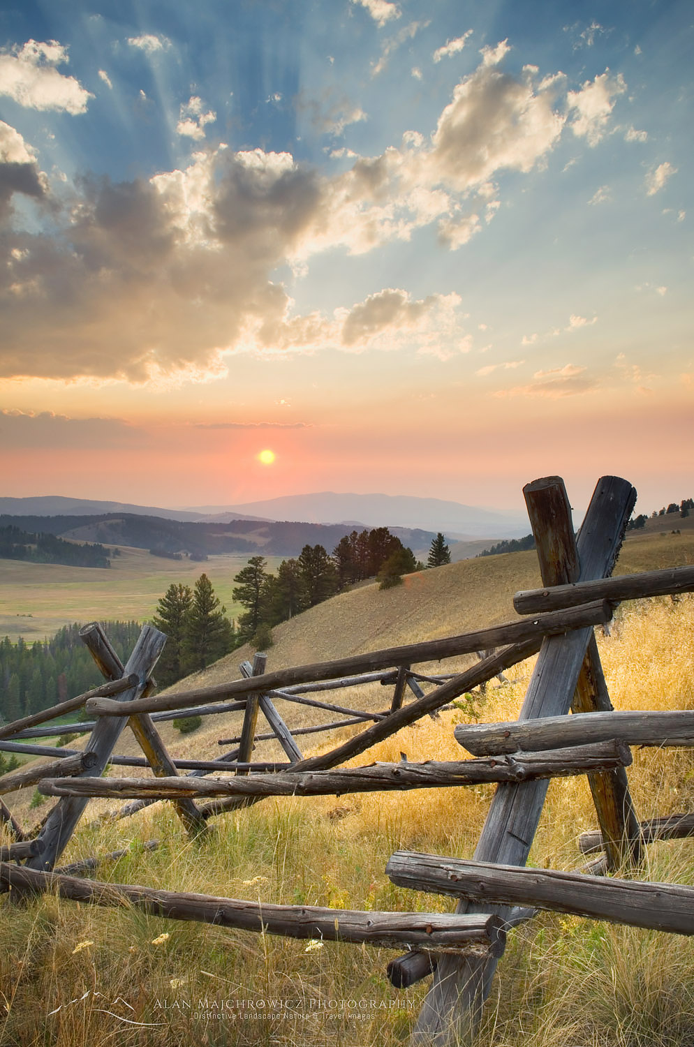 Classic log fence in ranch lands of Granite County Montana at sunset #49807