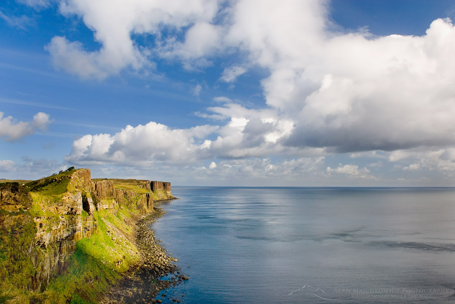 Dunite cliffs on the coast of Isle of Skye Scotland, Kilt Rock is in the distance #11935