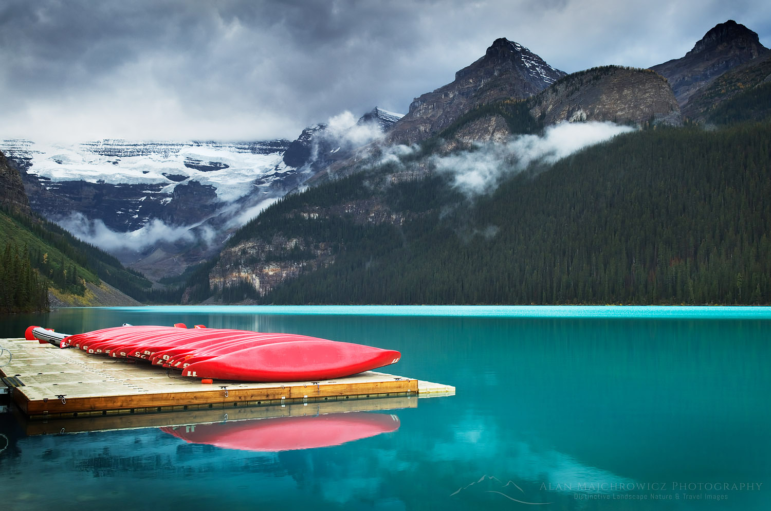 Red canoes on dock, Lake Louise, Banff National Park #54792