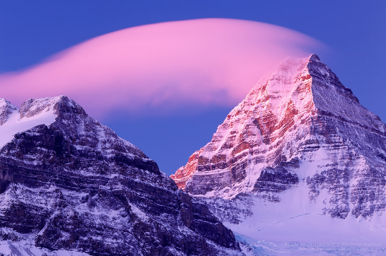Cloud streaming off summit of Mount Assiniboine in winter, Mount Assiniboine Provincial Park British Columbia #3248
