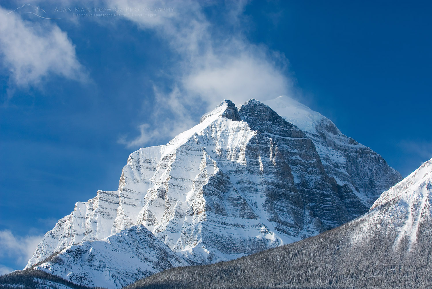Clouds and snow blowing off the summit of Mount Temple on a cold winter morning, Banff National Park Alberta Canada #43881