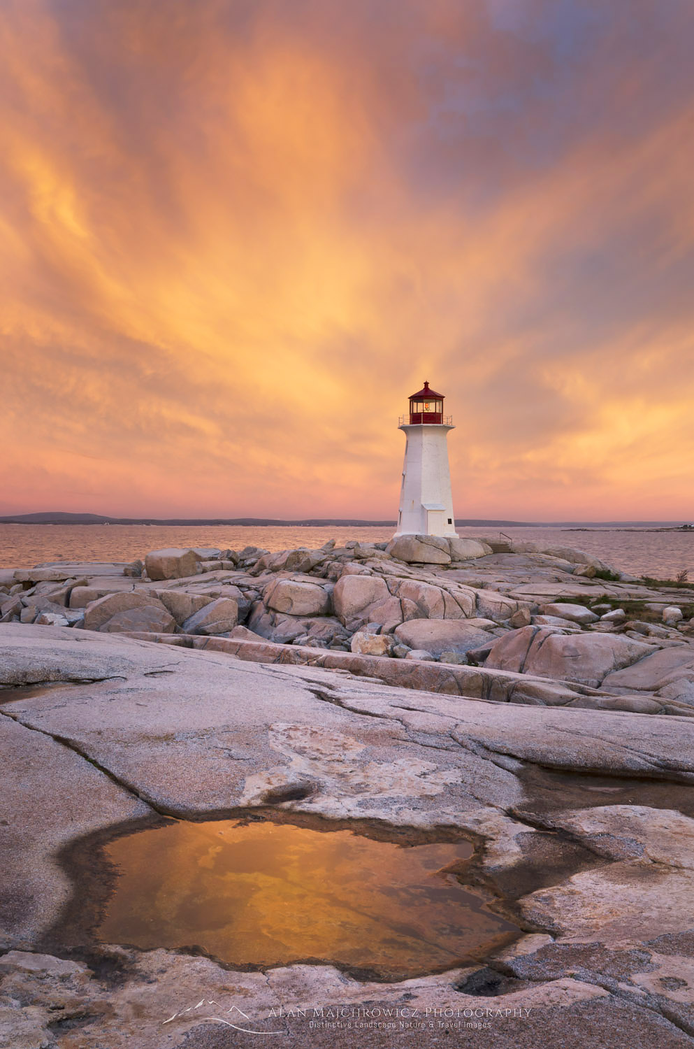 Sunrise at Peggy's Cove Lighthouse heralds in approaching storm, Nova Scotia #58921