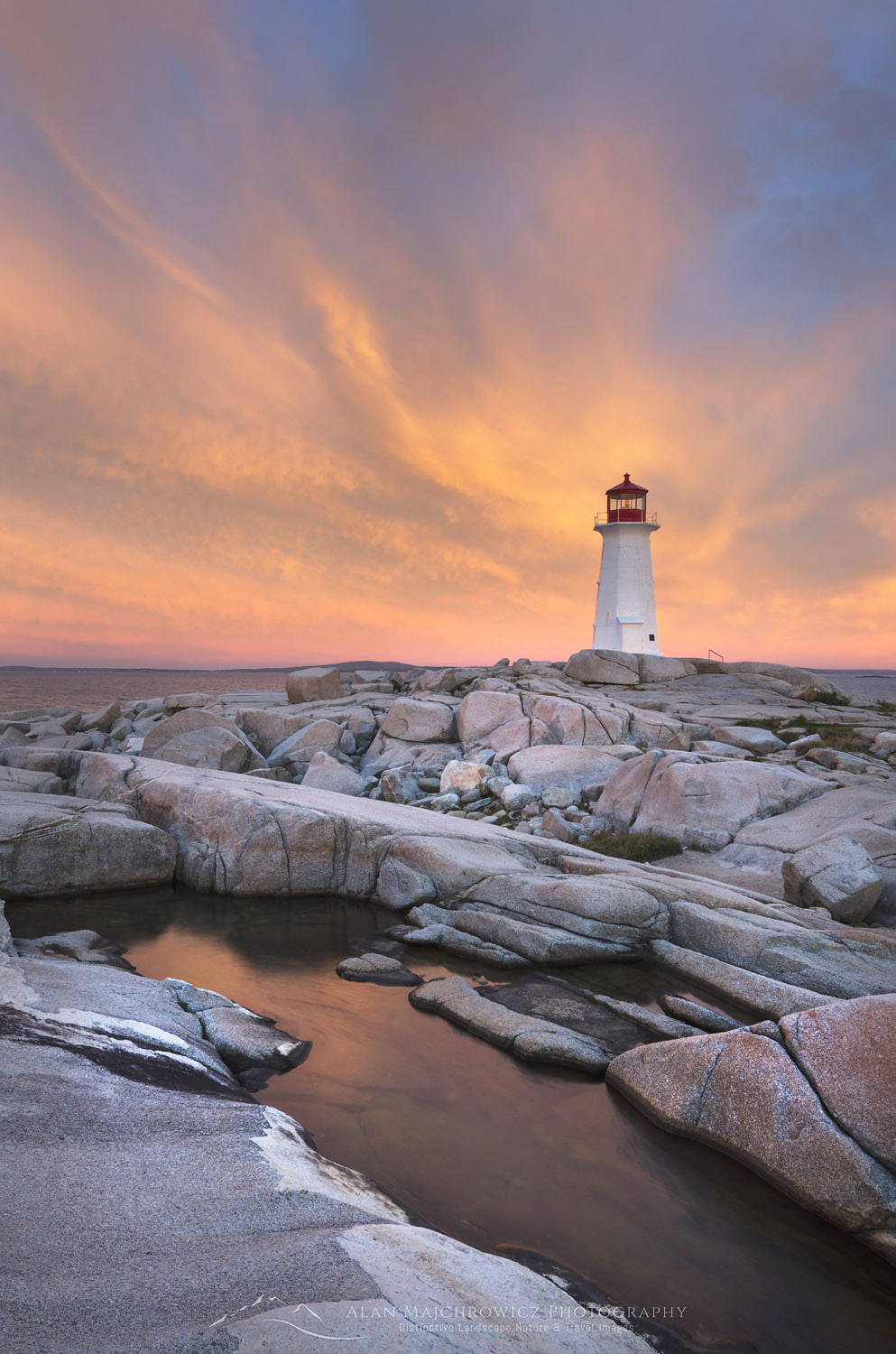 Sunrise at Peggy's Cove Lighthouse heralds in approaching storm, Nova Scotia #58923