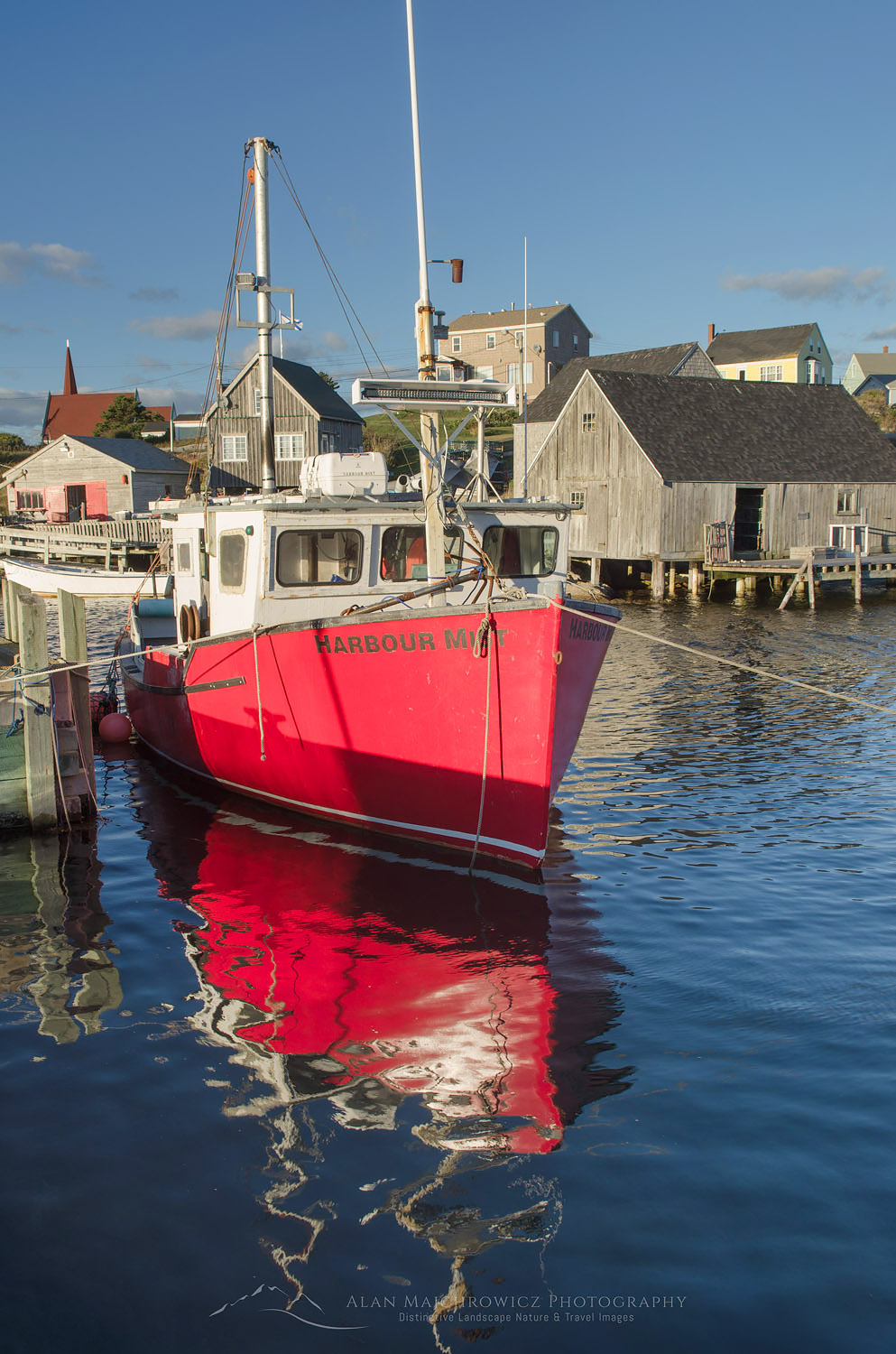 Red fishing boat and fisherman's shacks at Peggy's Cove Nova Scotia #58869