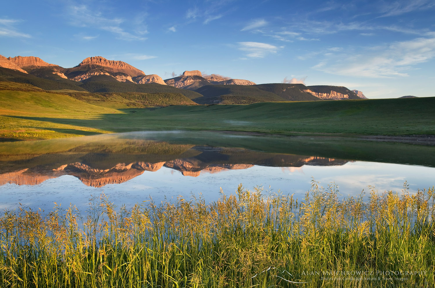 Rocky Mountain Front Range reflected in pond near Choteau Montana #53133