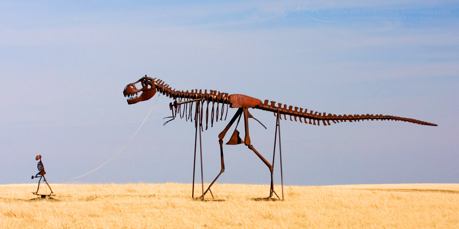 Sculpture of a Human skeleton walking a T-Rex skelton along Interstate 90 in South Dakota #22482