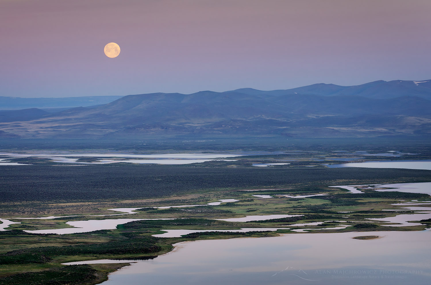 Full moon setting over Warner Lakes Wetlands, seen from Hart Mountain National Antelope Refuge, Oregon #60946