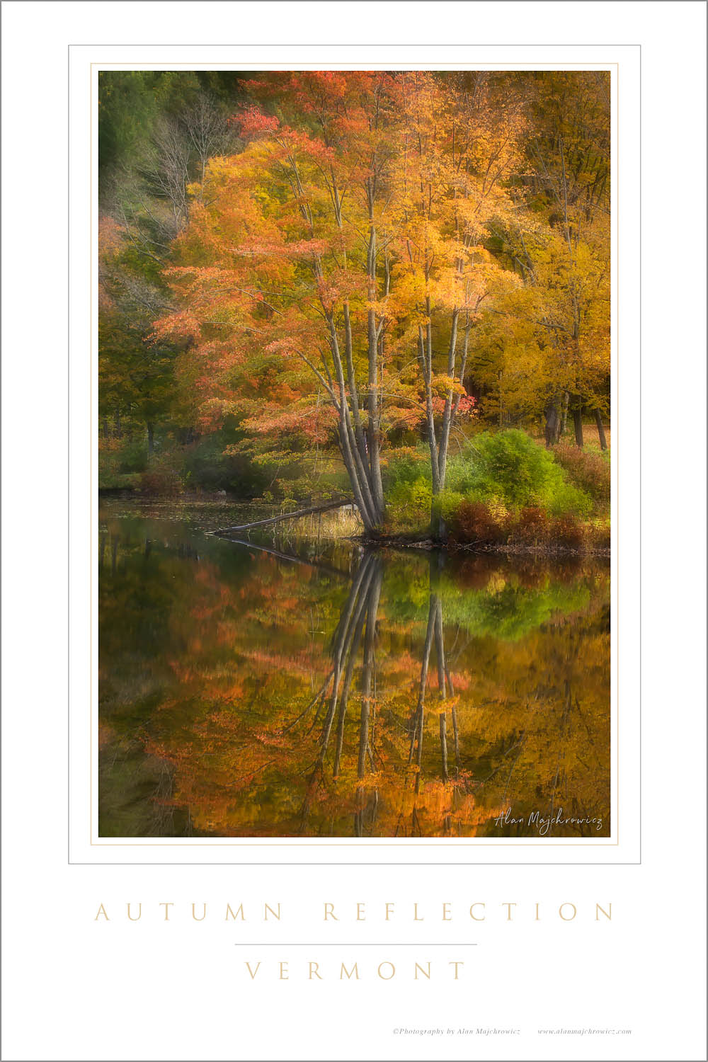 Fall foliage reflected in Lake Pauline, Vermont