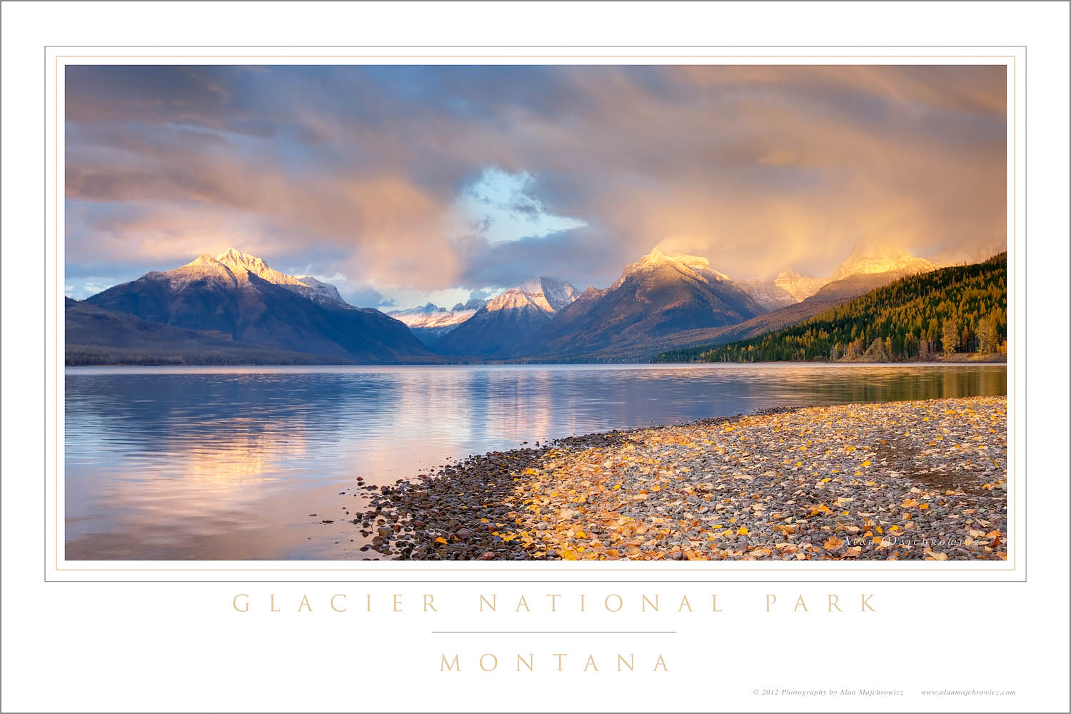 Fallen leaves line the shore of Lake McDonald as a passing storm glows in the evening light, Glacier National Park