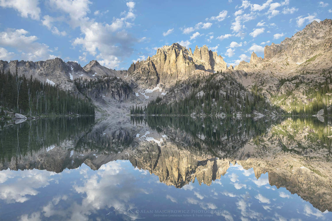 Monte Verita Peak mirrored in still waters of Baron Lake. Sawtooth Mountains Wilderness Idaho