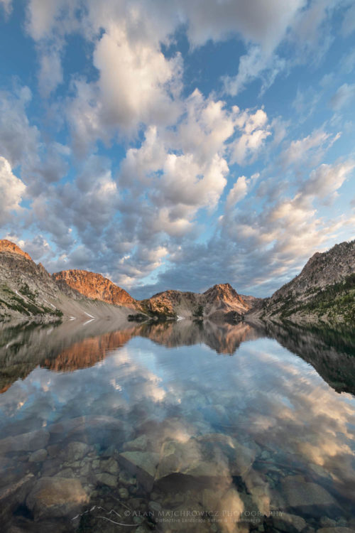 Morning clouds mirrored in still waters of Sawtooth Lake. Sawtooth Mountains Wilderness Idaho #65958