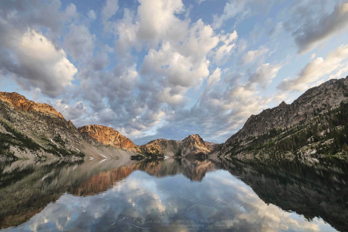 Morning clouds mirrored in still waters of Sawtooth Lake. Sawtooth Mountains Wilderness Idaho #65960