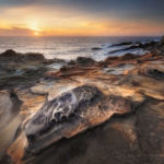 Eroded sandstone concretions and formations at Shore Acres State Park Oregon. #68579or