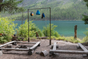 Food bags hanging for bear safety at food prep area of Kintla Lake Campsite Glacier National Park Montana
