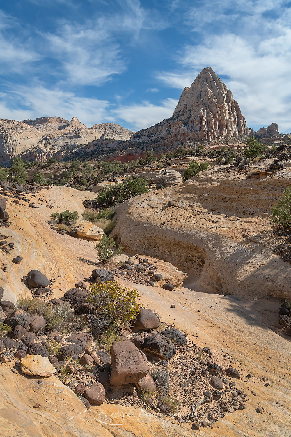 Pectols Pyramid and black lava boulders. Capitol Reef National Park Utah #75341