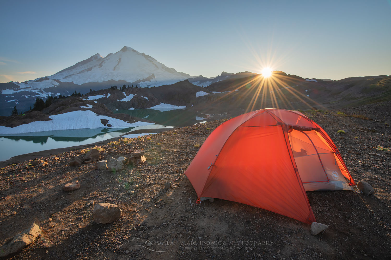 Sunset over Mount Baker and red Big Agnes backpacking tent at backcountry camp on Ptarmigan Ridge, Mount Baker Wilderness. North Cascades Washington #73634