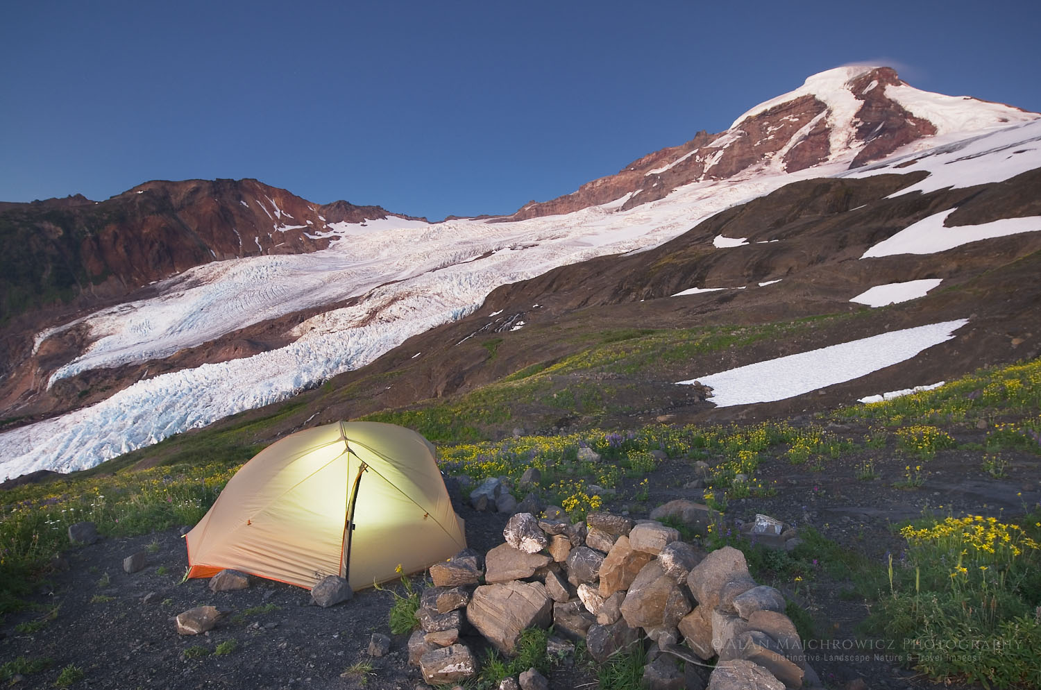 Tent illuminated at climbers camp on Heliotrope Ridge, Mount Baker Wilderness Washington #54432