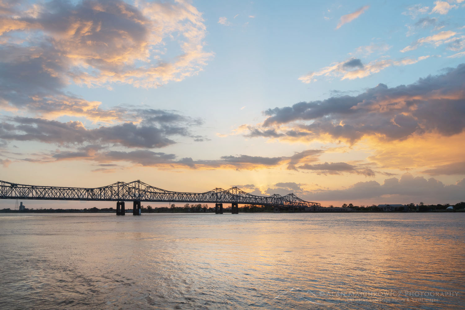 Natchez–Vidalia Bridge over the Mississippi River at sunset. Seen from Natchez Mississippi $77433