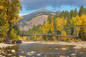 Tawlks-Foster Suspension Bridge and fall foliage along the Methow River near Mazama Washington