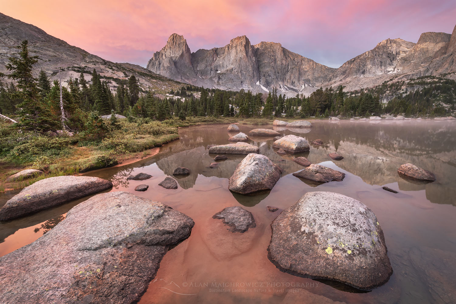 War Bonnet and Warrior Peaks reflected in Lonesome Lake at dawn in Cirque of the Towers, Popo Agie Wilderness Wind River Range Wyoming #78379