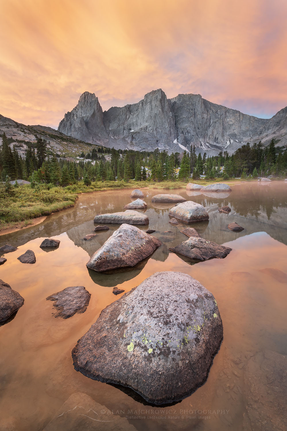 War Bonnet and Warrior Peaks reflected in Lonesome Lake at dawn in Cirque of the Towers, Popo Agie Wilderness Wind River Range Wyoming #78388