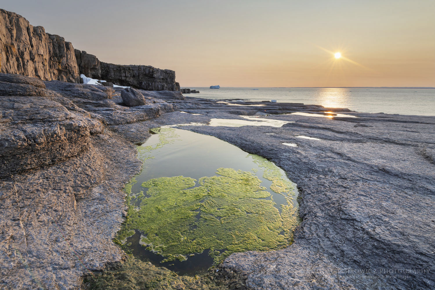 Sunset over Cape Norman on the Great Northern Peninsula. Cape Norman is the northernmost point of insular Newfoundland. Newfoundland and Labrador Canada #80394