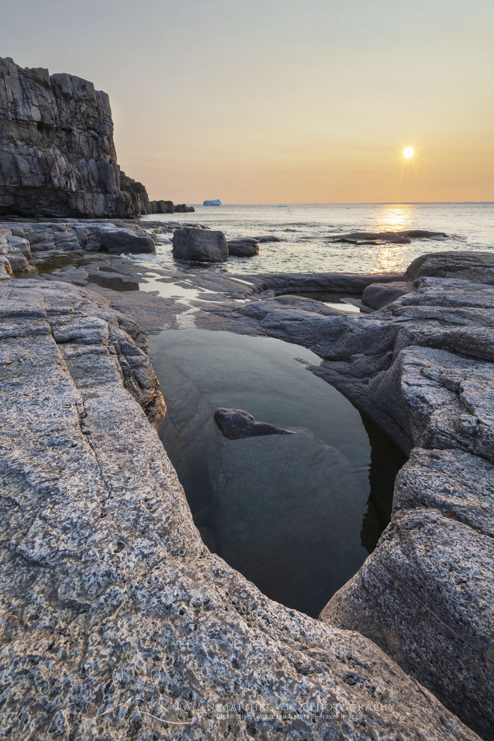 Sunset over Cape Norman on the Great Northern Peninsula. Cape Norman is the northernmost point of insular Newfoundland. Newfoundland and Labrador Canada #80404