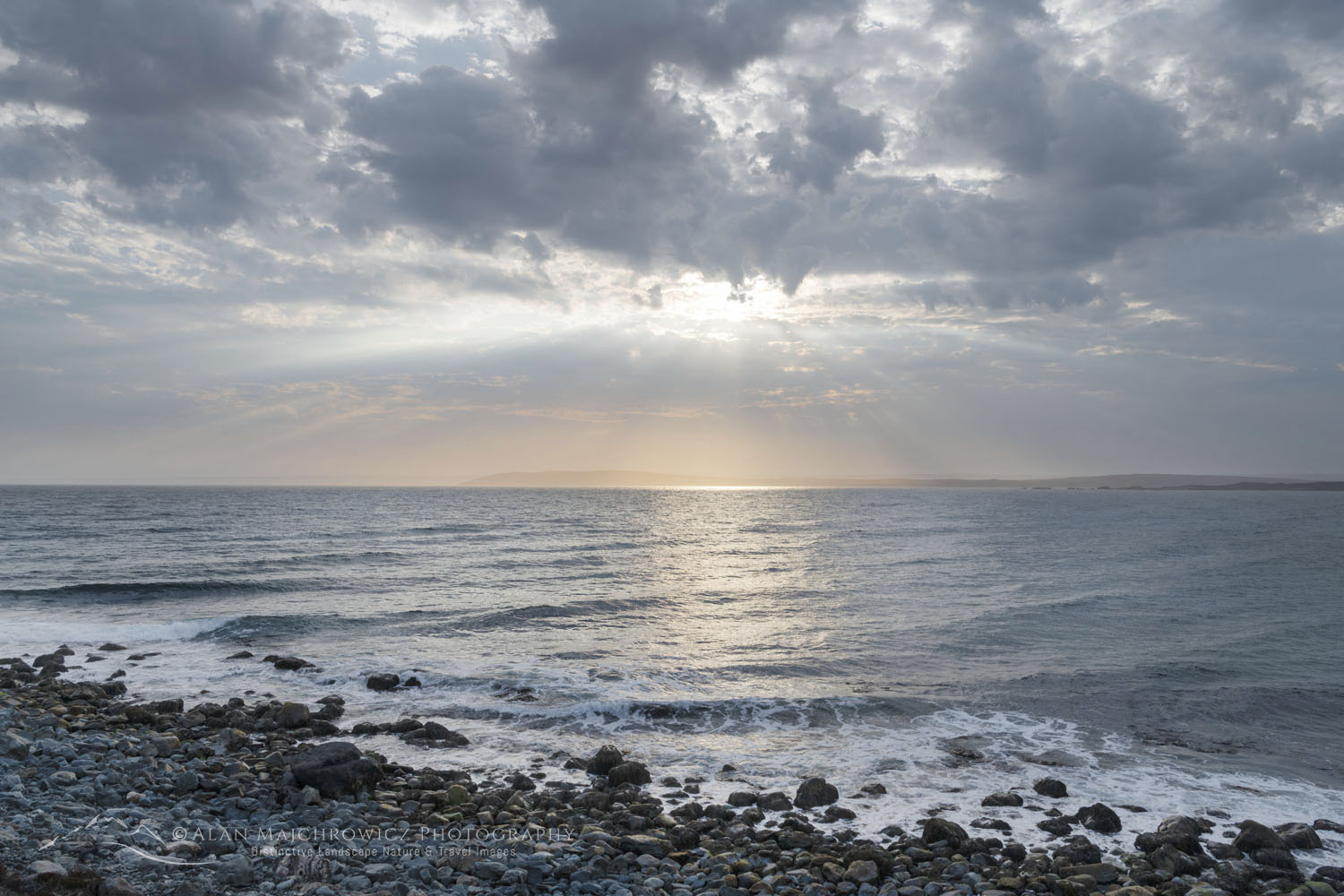 Suns rays shining through clouds at Portugal Cove, Avalon Peninsula. Newfoundland and Labrador Canada #80669