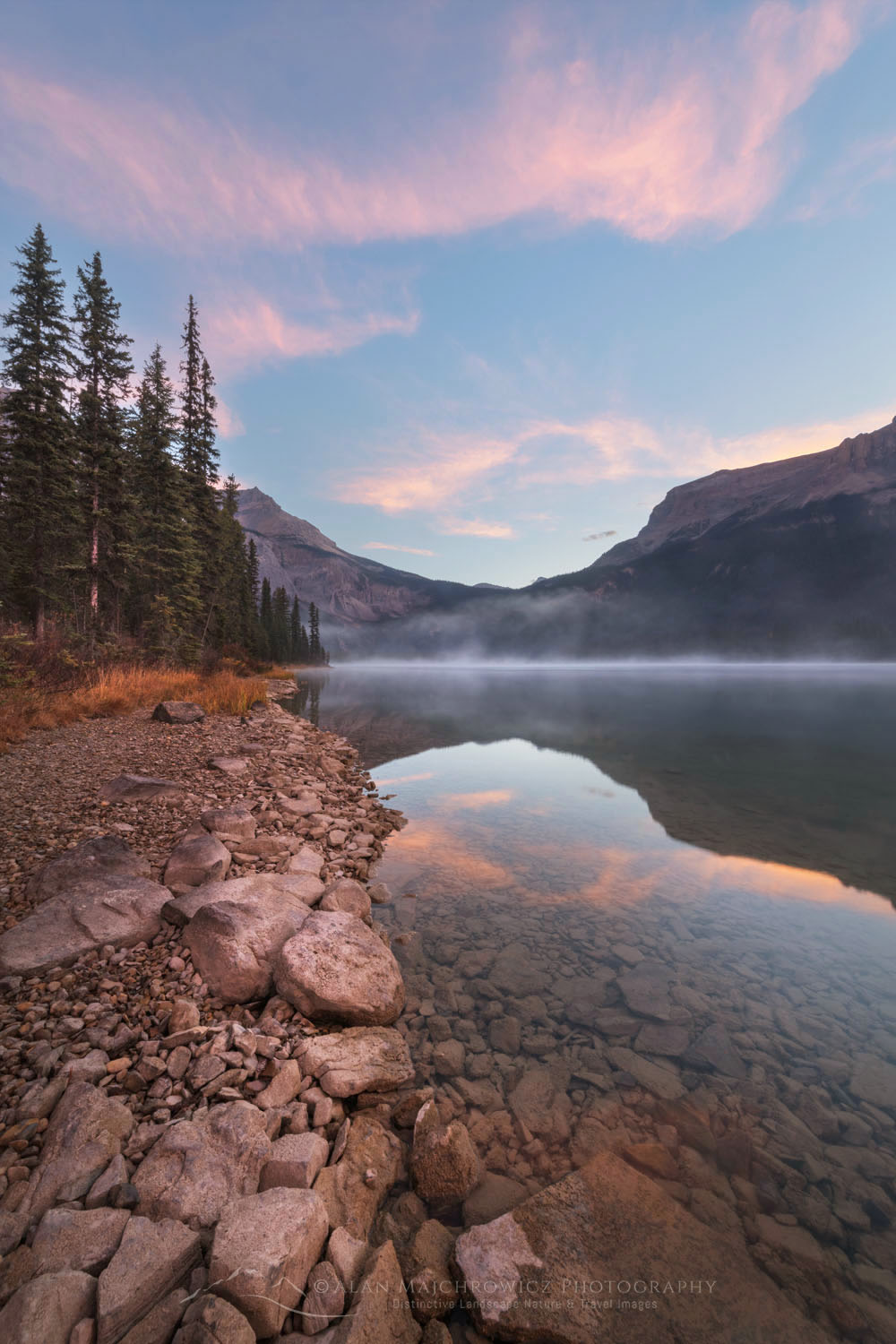 Alpenglow is reflected in the still waters of Emerald Lake in the Canadian Rockies. Yoho National Park British Columbia Canada #81750