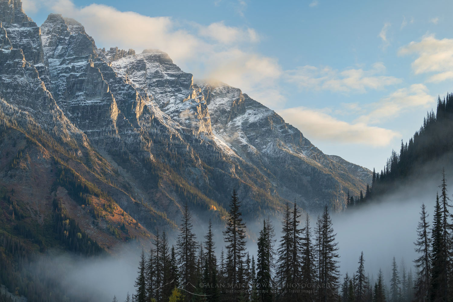 Mount Tupper shrouded in clouds and fog. Seen from Rogers Pass in the Selkirk Mountains. Glacier National Park British Columbia Canada #81265