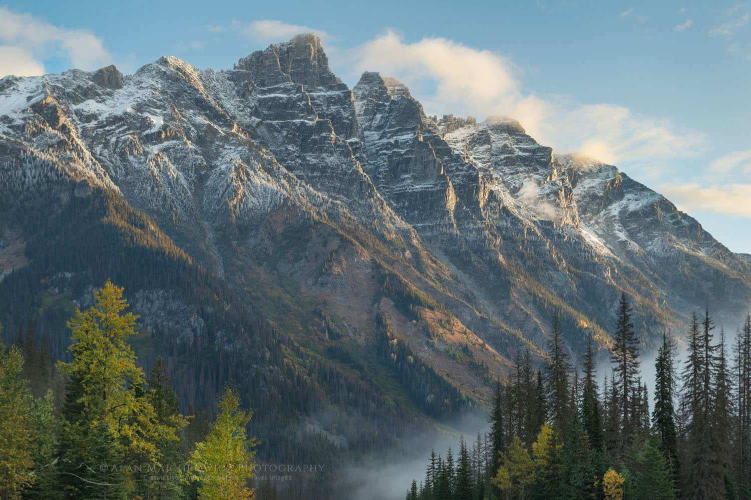 Mount Tupper shrouded in clouds and fog. Seen from Rogers Pass in the Selkirk Mountains. Glacier National Park British Columbia Canada #81266