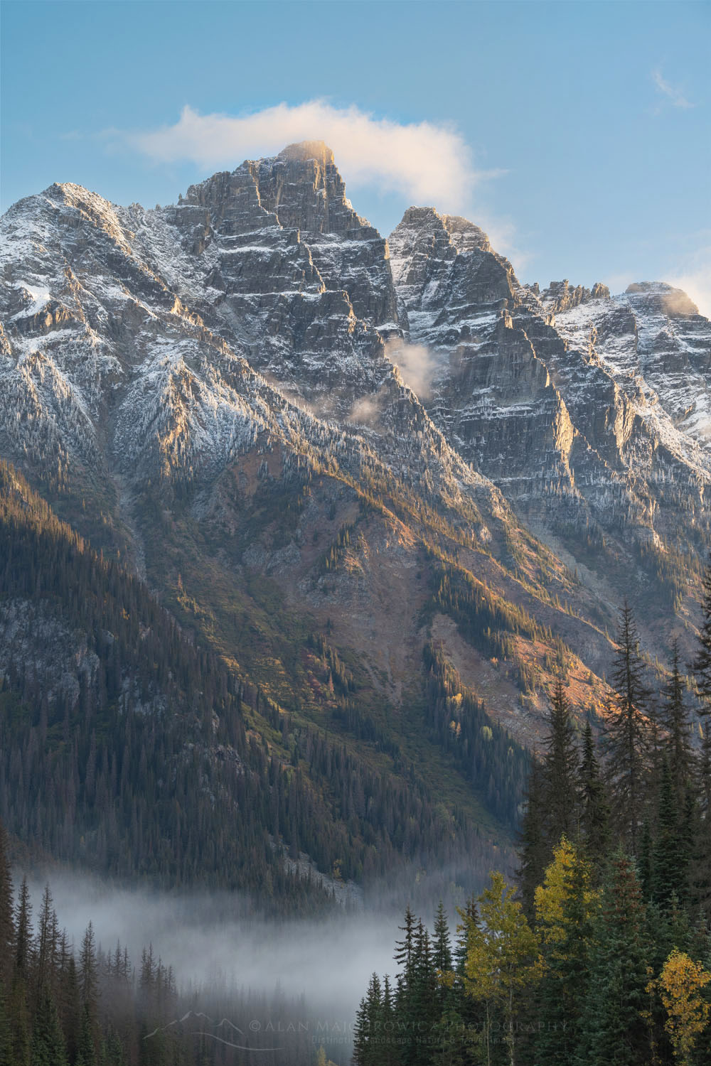Mount Tupper shrouded in clouds and fog. Seen from Rogers Pass in the Selkirk Mountains. Glacier National Park British Columbia Canada #81274