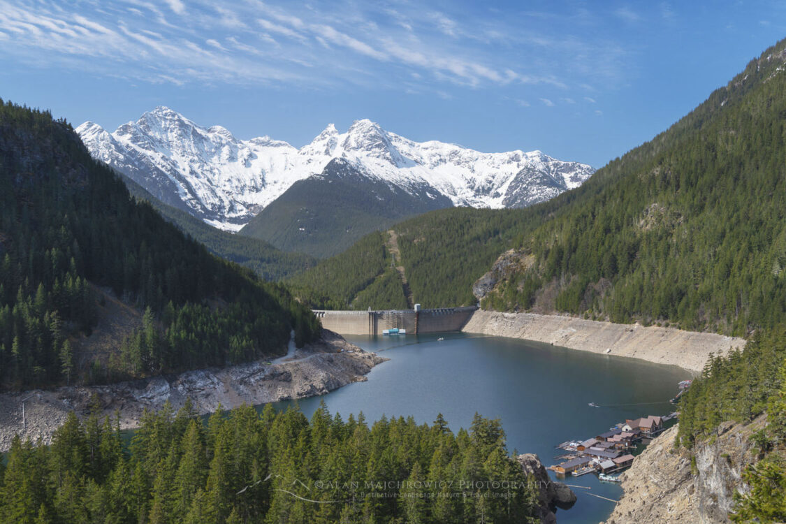 Ross Dam and Ross Lake during spring drawdown. Colonial and Pyramid Peaks are in the distance. Ross Lake Narional Recreation Area, North Cascades Washington #79459