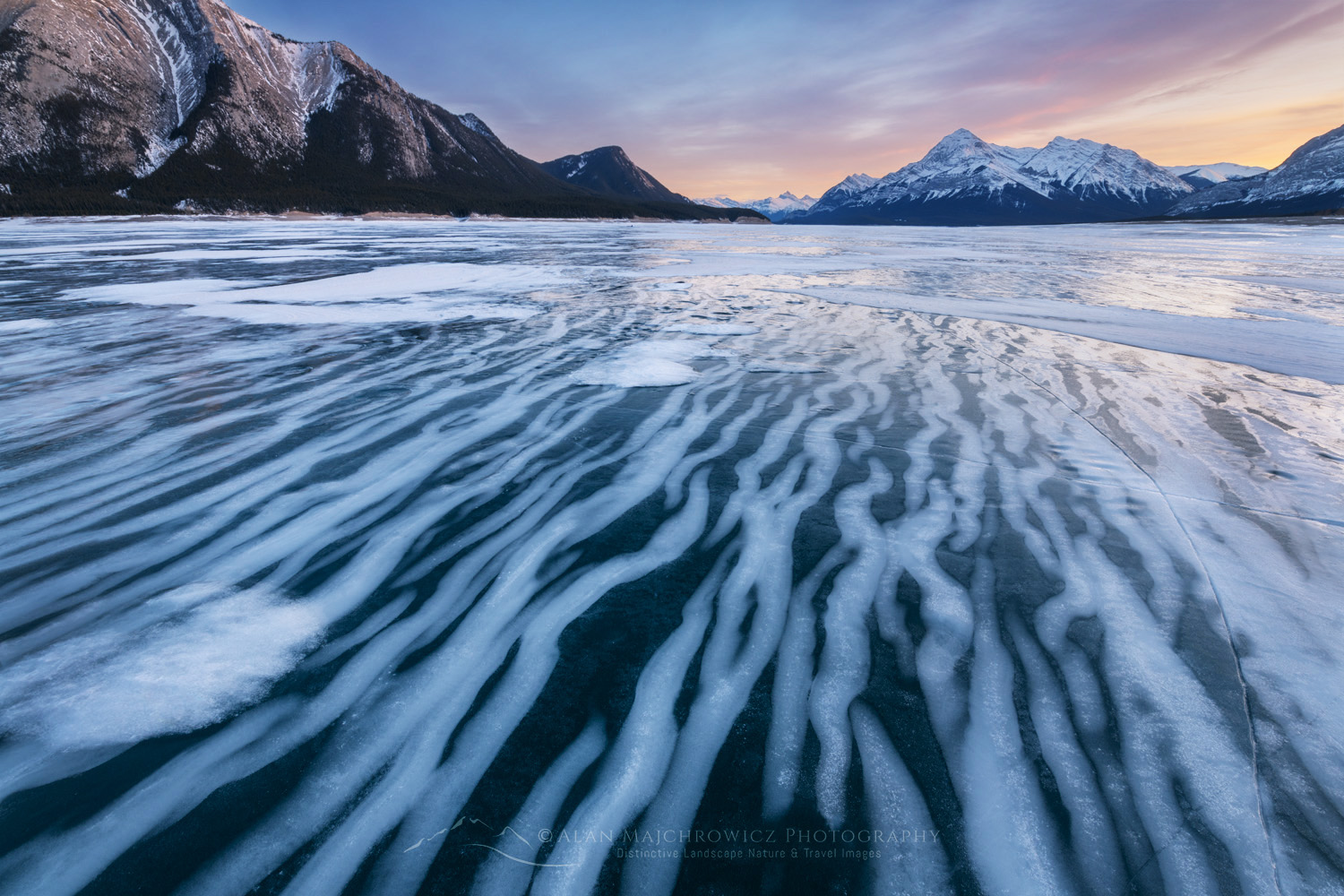 Striped patterns of snow frozen in the surface of Abraham Lake Alberta Canada #82380