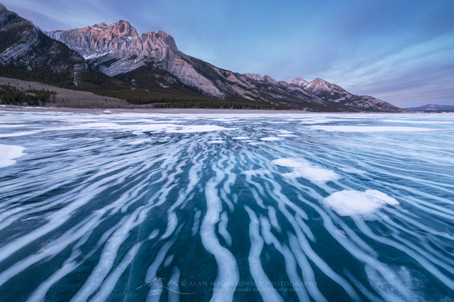 Striped patterns of snow frozen in the surface of Abraham Lake Alberta Canada #82398