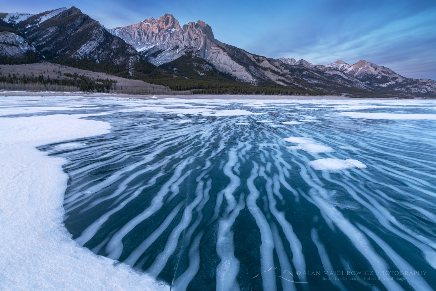 Striped patterns of snow frozen in the surface of Abraham Lake Alberta Canada #82403