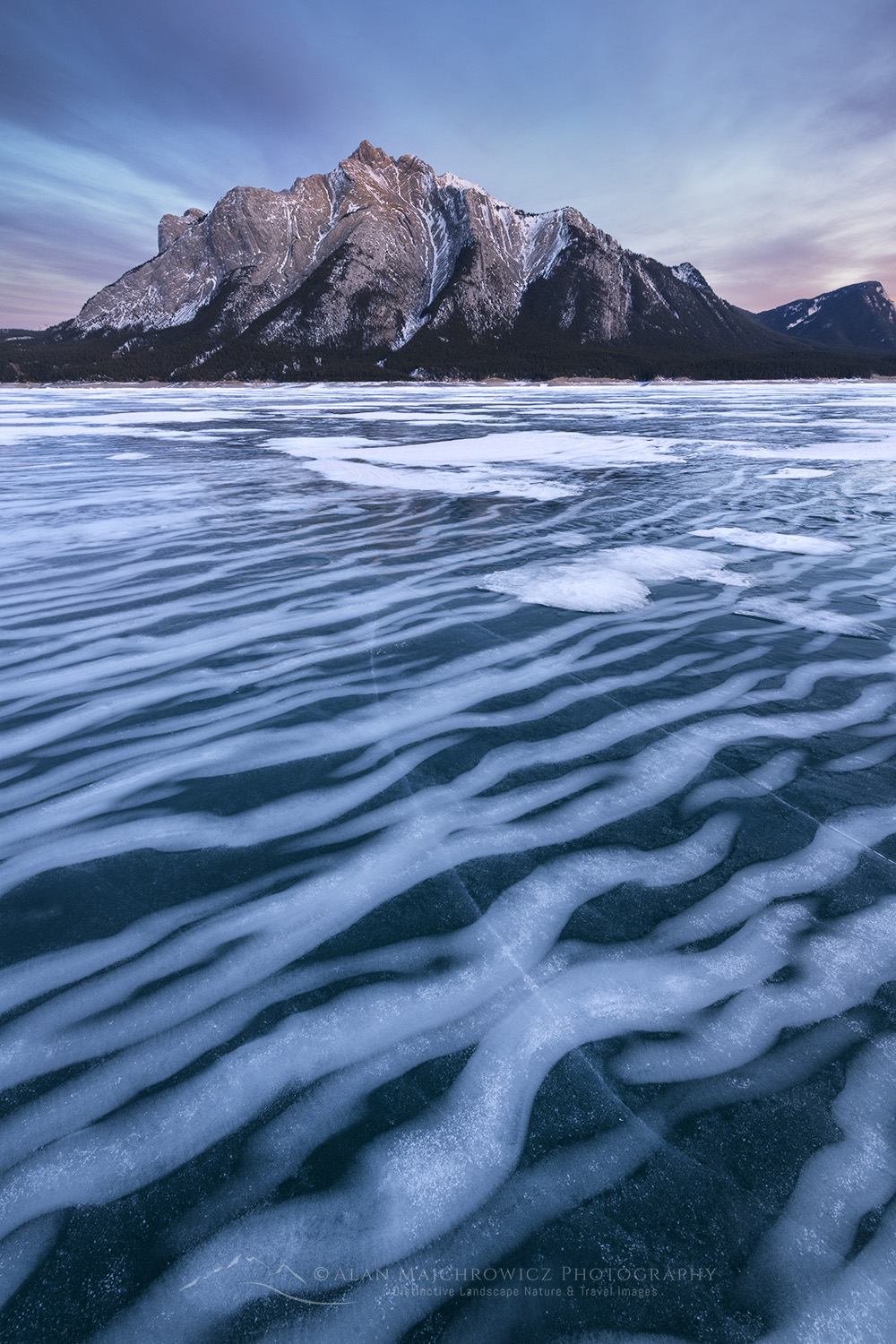 Striped patterns of snow frozen in the surface of Abraham Lake Alberta Canada #82414