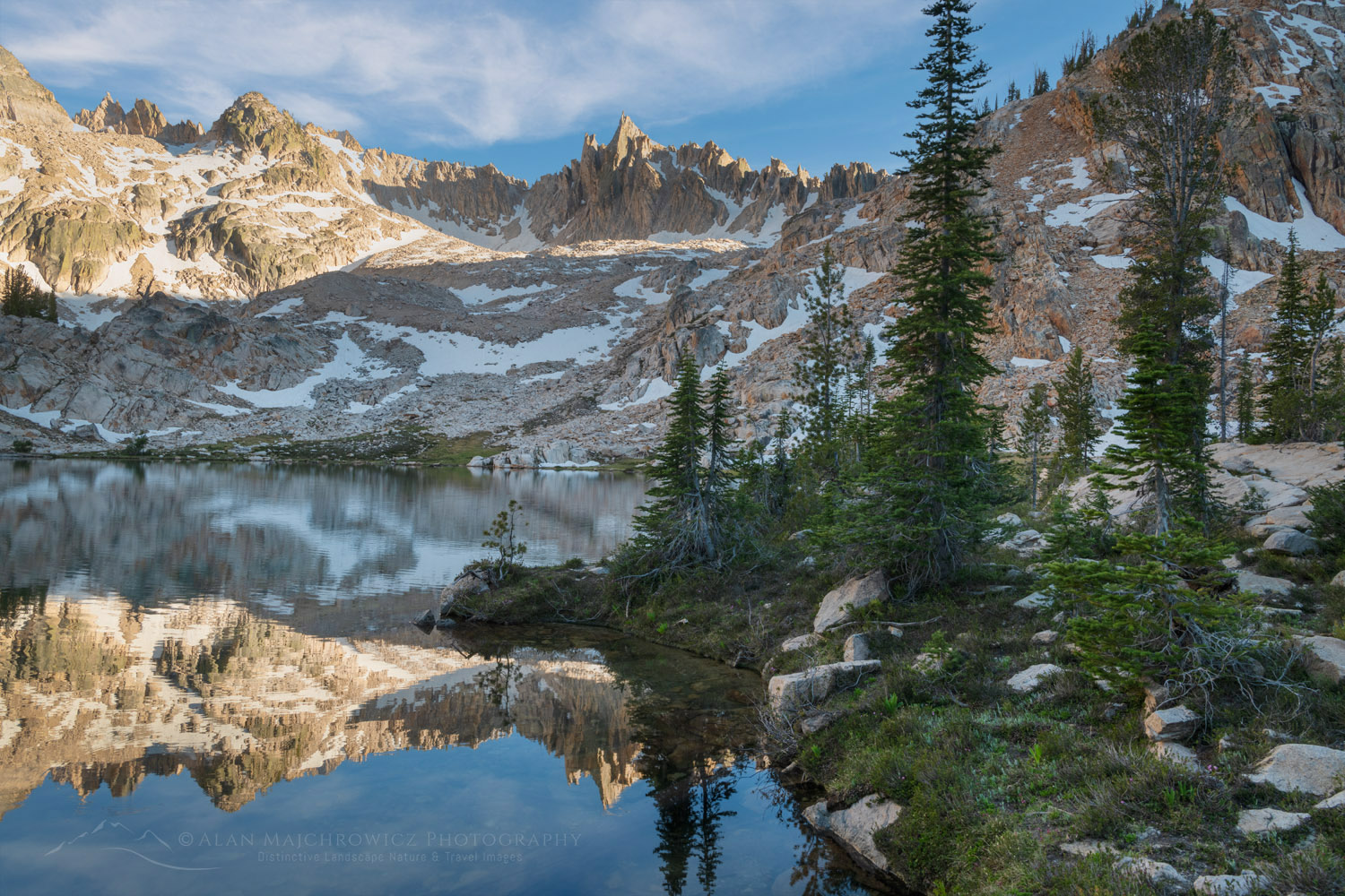 The Temple, is reflected in the still waters of a tarn in Cramer Basin. Sawtooth Wilderness, Idaho #83651