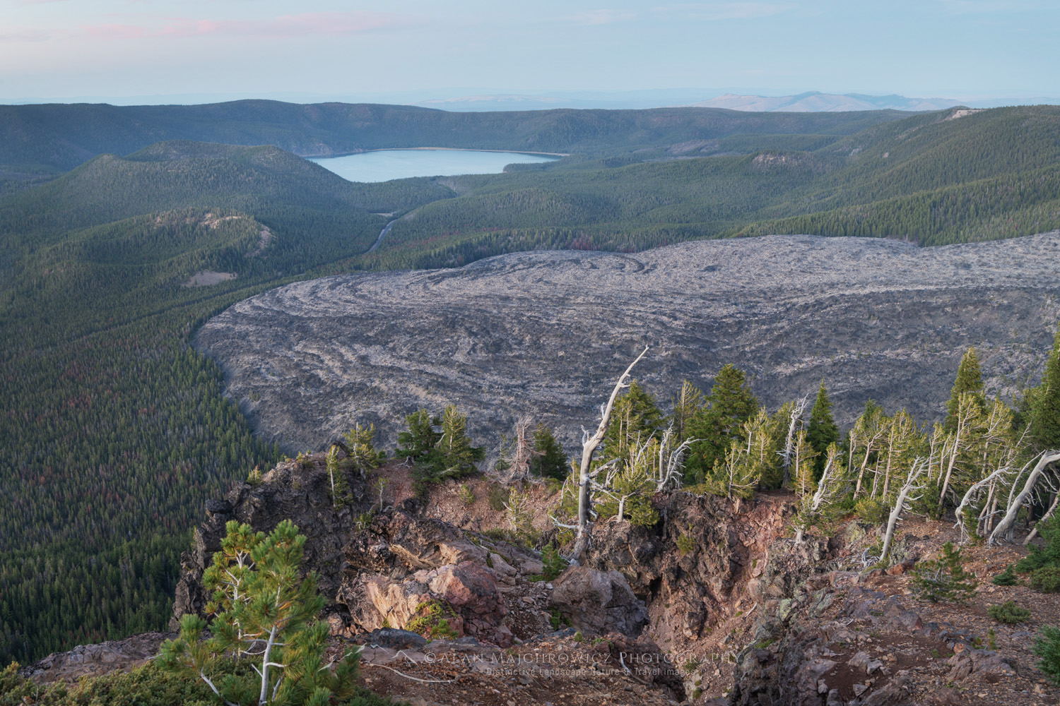 Big Obsidian Flow and East Lake, seen from Paulina Peak overlook. Newberry National Volcanic Monument, Oregon #84009