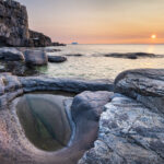 Sunset over Cape Norman on the Great Northern Peninsula. Cape Norman is the northernmost point of insular Newfoundland. Newfoundland and Labrador Canada #80455