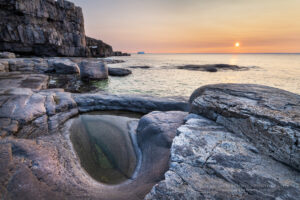 Sunset over Cape Norman on the Great Northern Peninsula. Cape Norman is the northernmost point of insular Newfoundland. Newfoundland and Labrador Canada #80455