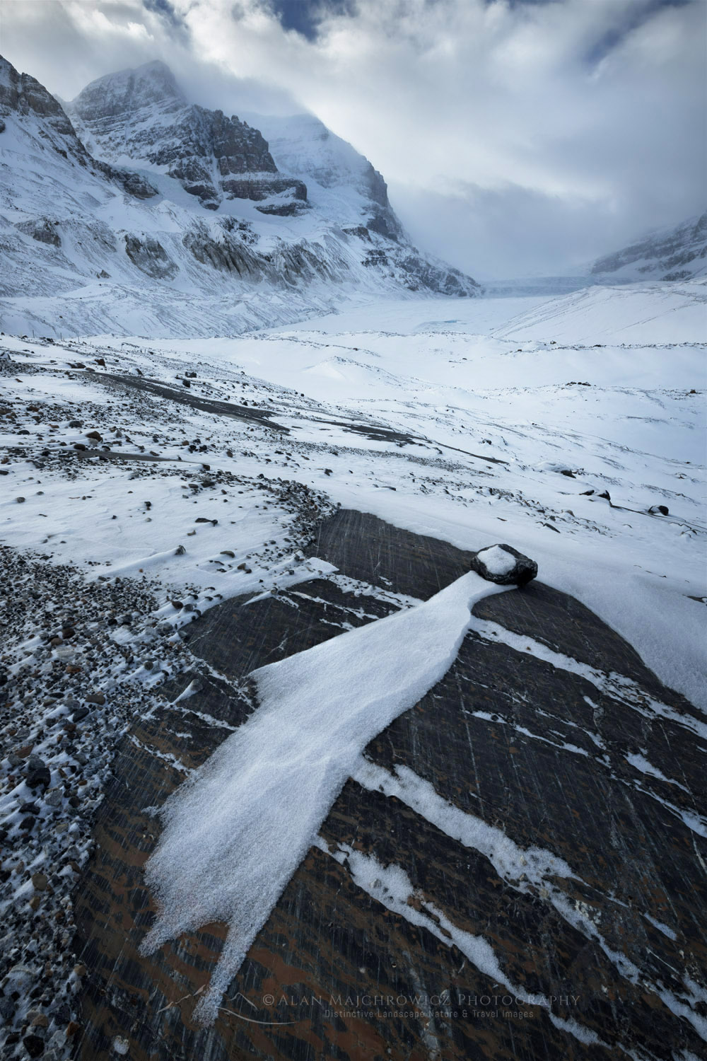 Windswept terminal moraine of Athabasca Glacier in winter Mount Andromeda and Athabasca Glacier are in the distance. Jasper National Park Alberta Canada #82245