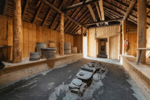 Interior of reconstructed lodgings at L’Anse aux Meadows National Historic Site. Sitting at the tip of the Great Northern Peninsula of the island of Newfoundland, the remains of an 11th-century Viking settlement are evidence of the first European presence in North America. #80533