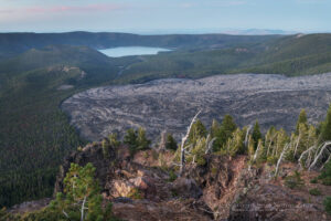 Big Obsidian Flow and East Lake, seen from Paulina Peak overlook. Newberry National Volcanic Monument, Oregon #84009