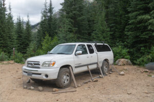 Chicken wire wrapped around pickup truck to protect against porcupine damage. Valhalla Provincial Park, West Kootenays British Columbia Canada #80731