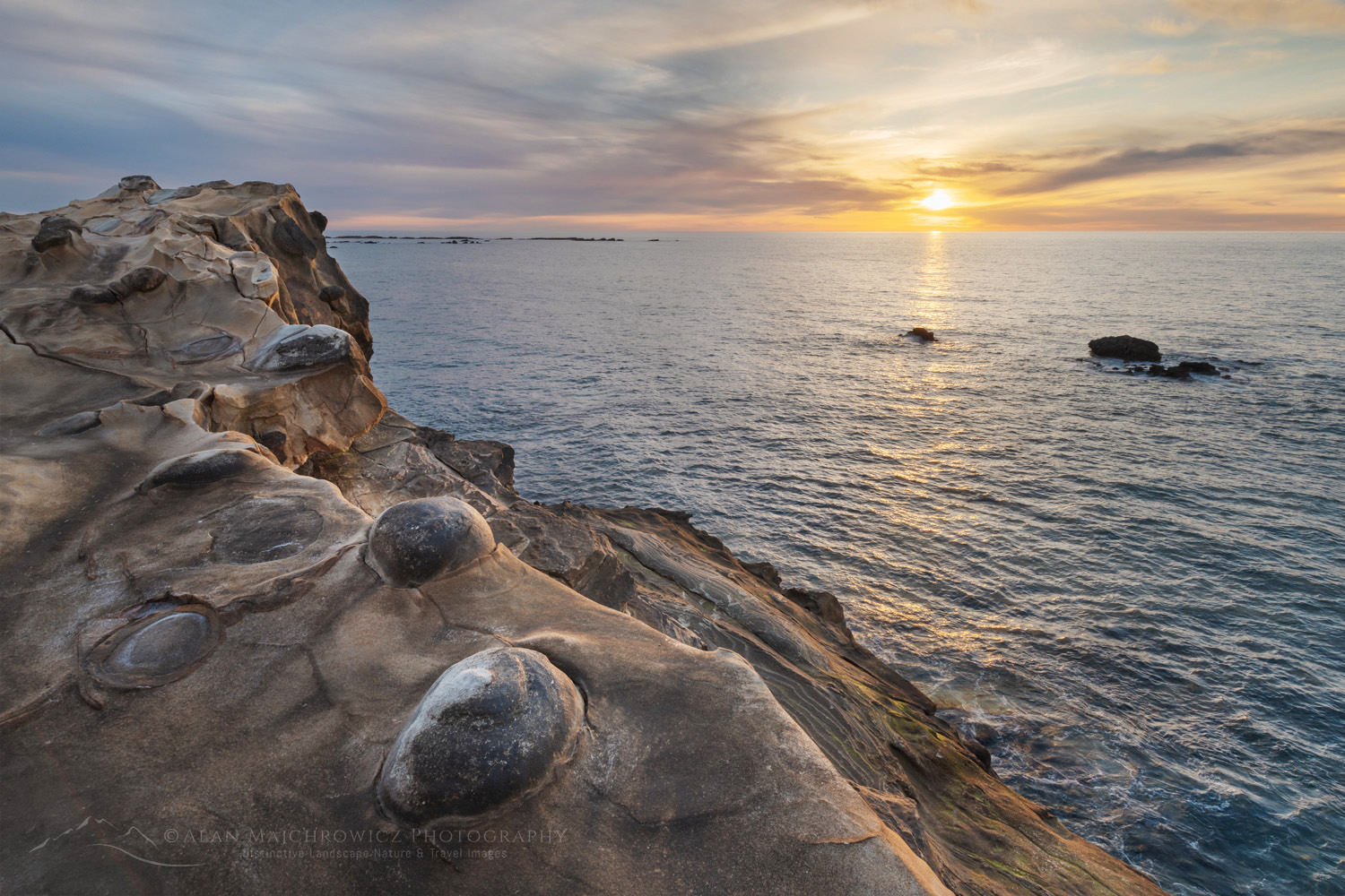Sunset over Mineral concretions on cliffs of Shore Acres State Park Oregon #82993