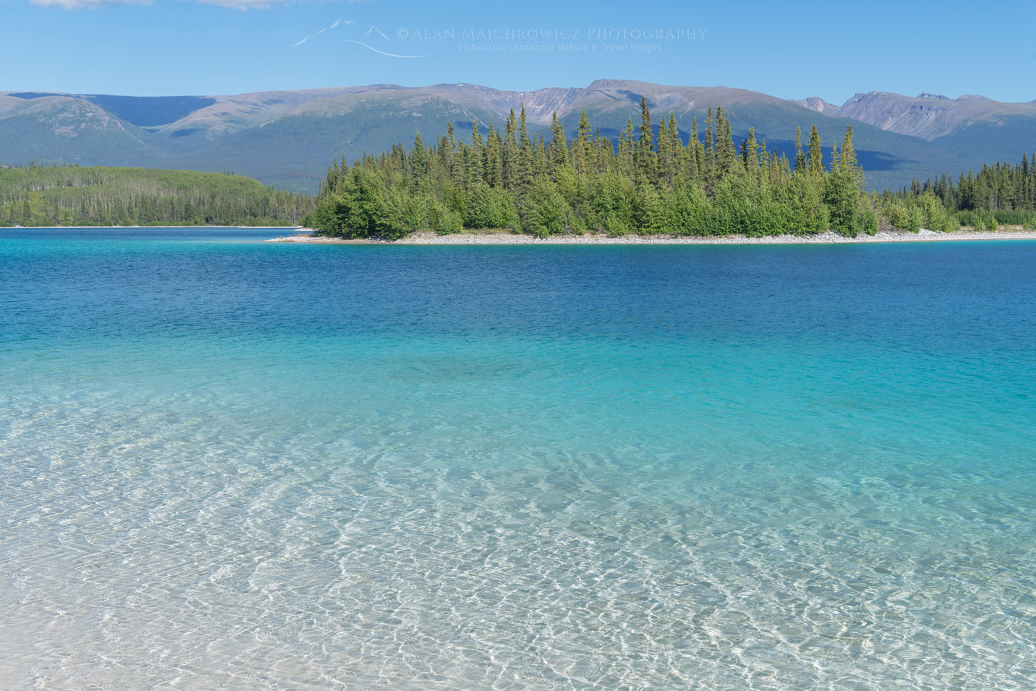 Turquoise waters of Tā Ch'ilā Park (Boya Lake Park) British Columbia #86925